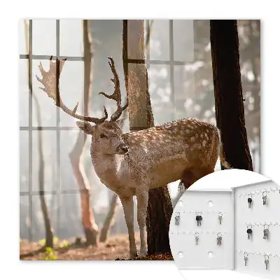 Tableau décoratif Des cerfs dans la forêt au coucher du soleil