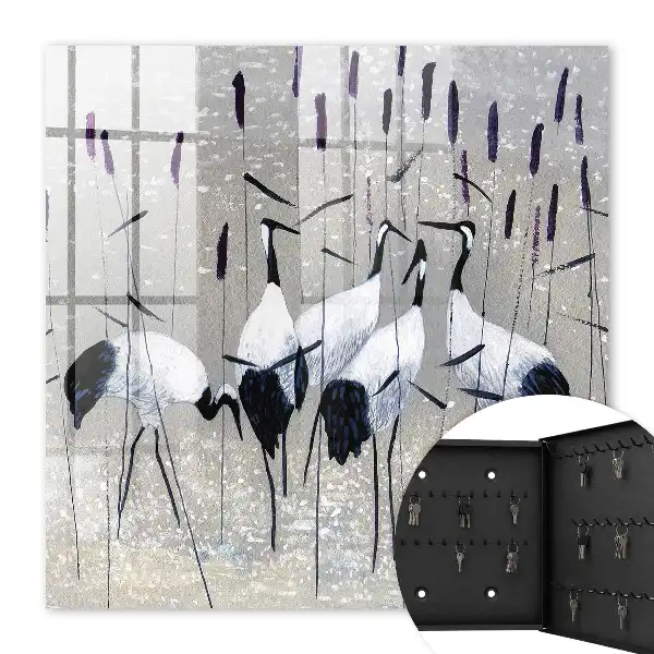 Grues et roseaux dans un paysage pastel