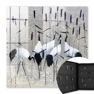 Grues et roseaux dans un paysage pastel