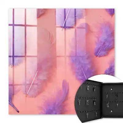 Plumes violettes sur fond rose