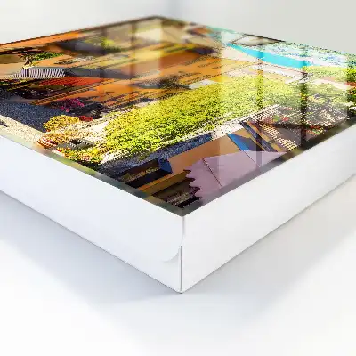 Tableau d'une ville colorée aux maisons pittoresques