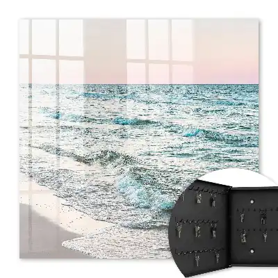 Vagues de la mer au coucher du soleil