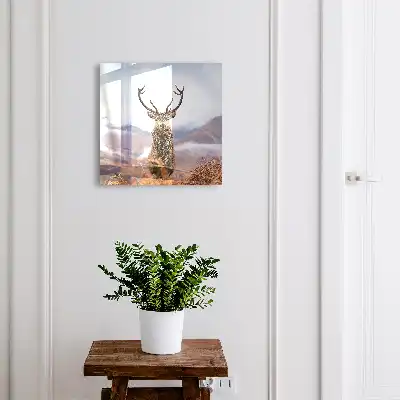 Tableau de cerfs de montagne dans un paysage brumeux