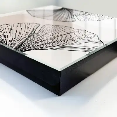 Papier peint motifs de feuilles noires sur fond crème