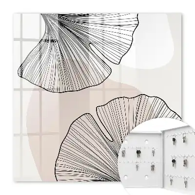Papier peint motifs de feuilles noires sur fond crème