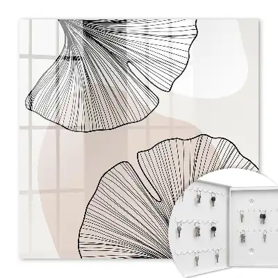 Papier peint motifs de feuilles noires sur fond crème