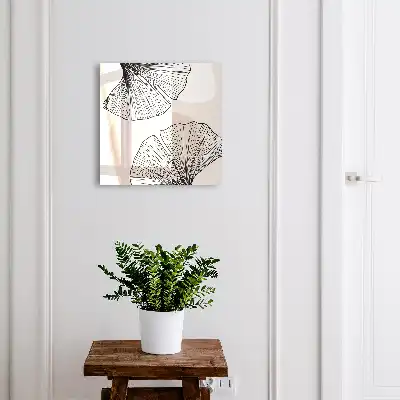 Papier peint motifs de feuilles noires sur fond crème