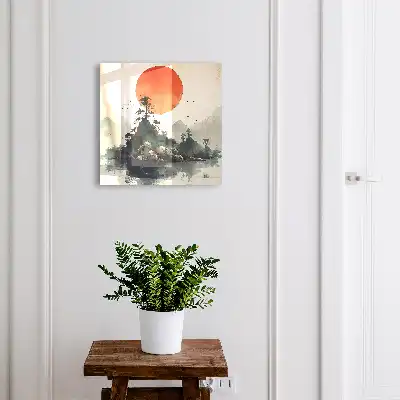 Paysage de montagne avec un soleil rouge
