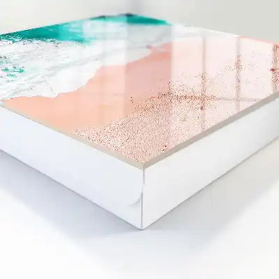 Océan et plage de sable rose