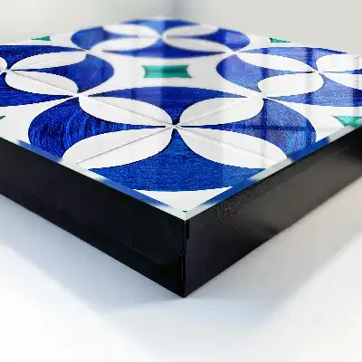 Motif géométrique dans les tons bleu-vert