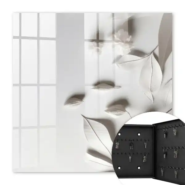 Feuilles blanches sur fond uni