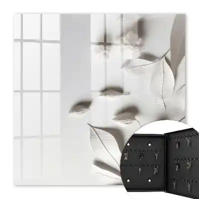 Feuilles blanches sur fond uni