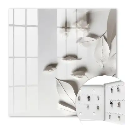 Feuilles blanches sur fond uni