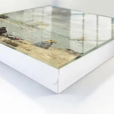 Tableau de voiliers avec des personnages sur le rivage
