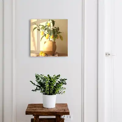 Citrons dans un pichet sur fond beige