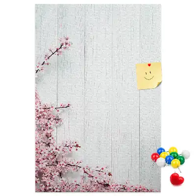 Tableau en liège avec motif floral sur fond bois