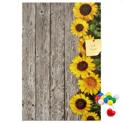 Tableau d'affichage en liège avec motif tournesols sur fond en bois