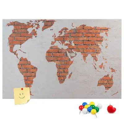 Tableau d’affichage en liège motif continents sur fond de brique