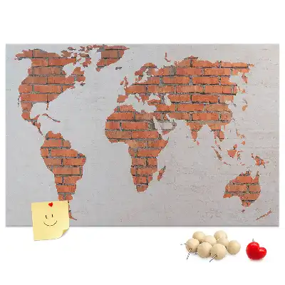 Tableau d’affichage en liège motif continents sur fond de brique
